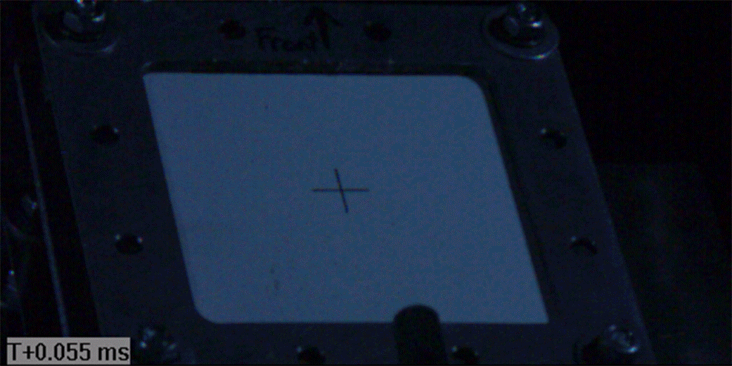 A projectile impacts the shield configuration dead center on the cross hair target.
