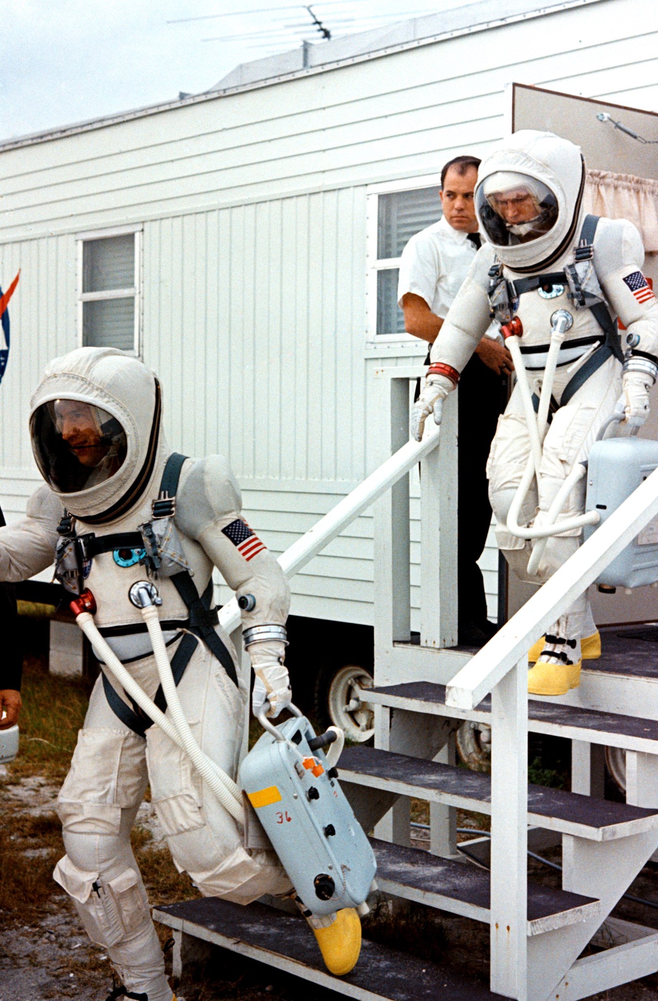 Astronauts wearing lightweight pressure suits