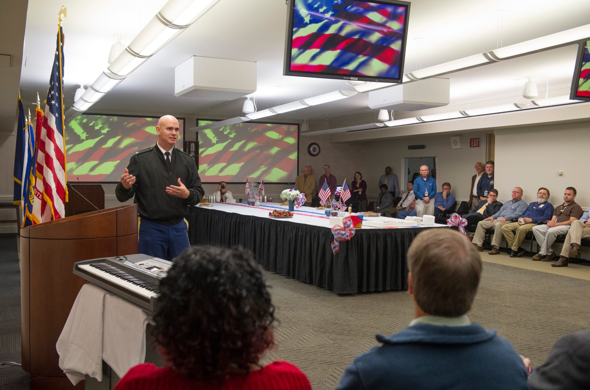 Col. Bill Marks, commander of the Redstone Garrison, addresses NASA Marshall Space Flight Center team members and veterans.