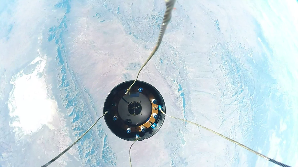 An UP Aerospace camera captures the separation in space of the Maraia capsule from Nose Fairing launch vehicle.