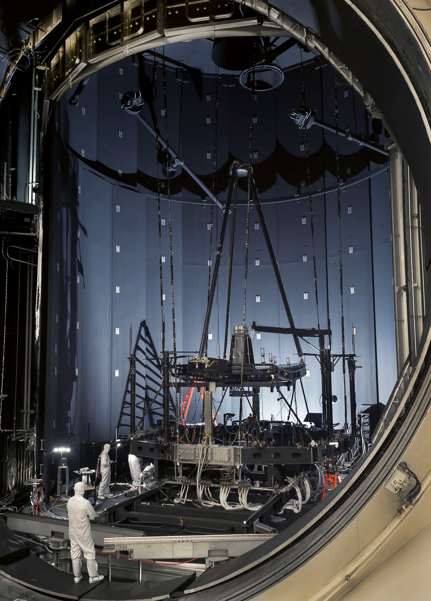 Engineers inspect the James Webb Space Telescope's "pathfinder telescope," after its second super-cold optical test