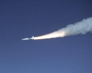 X-43A hypersonic research aircraft and its modified Pegasus booster rocket accelerate after launch