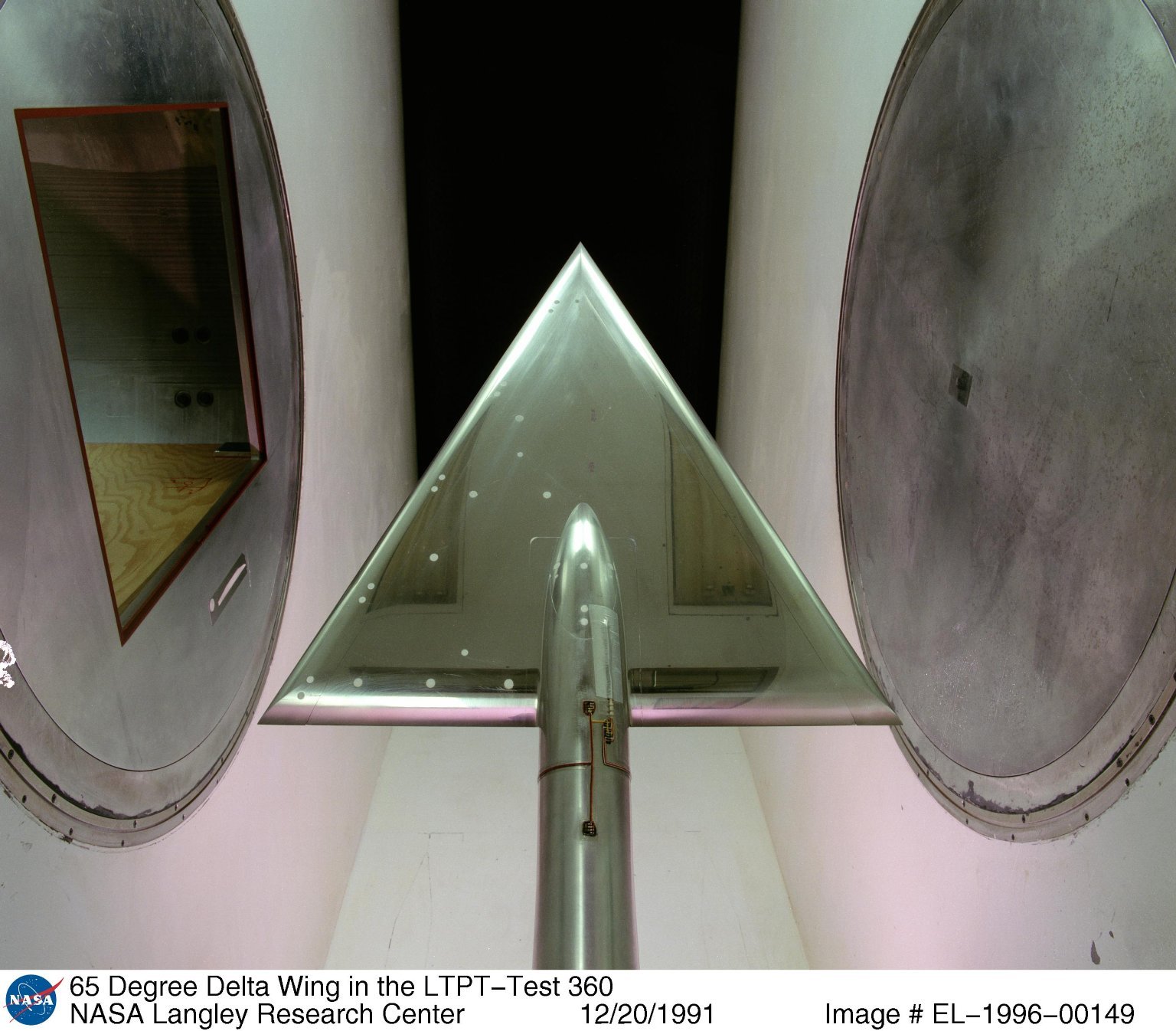 A delta wing model inside the National Transonic Facility.
