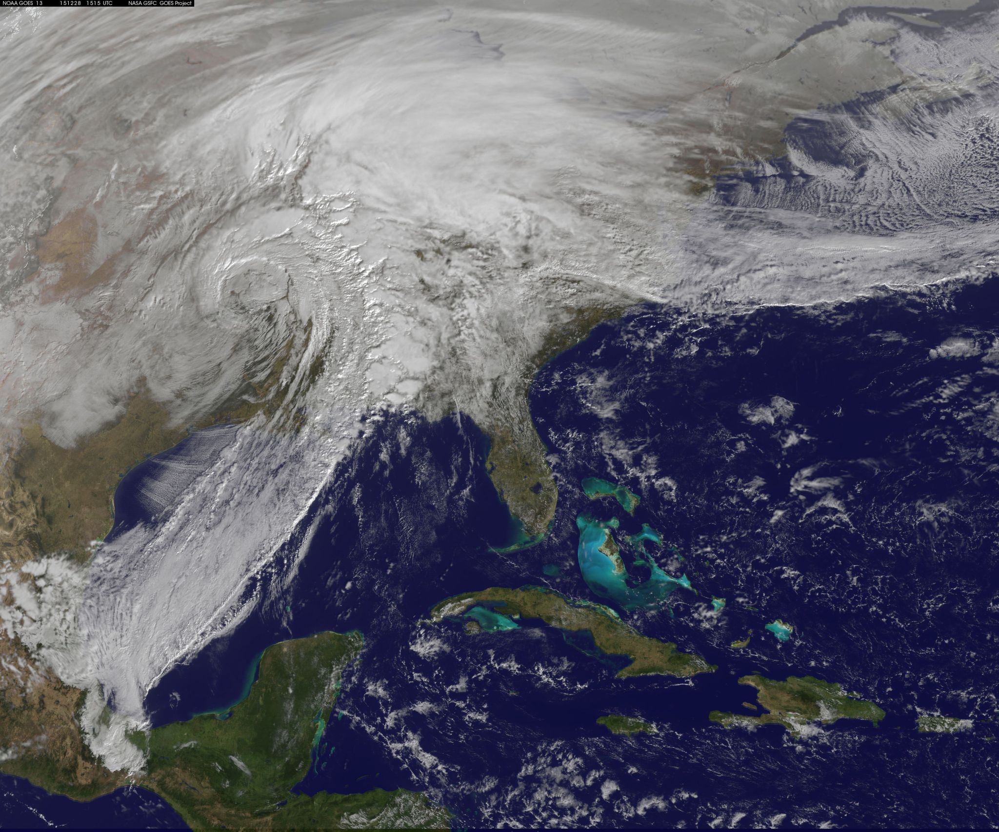 GOES-East satellite view of storm system that snow in the Four Corners region and tornadoes in Texas, Dec. 2015