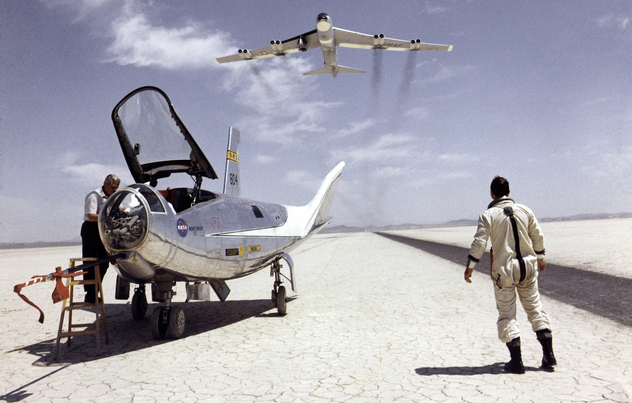 HL-10 on Lakebed with B-52 flyby