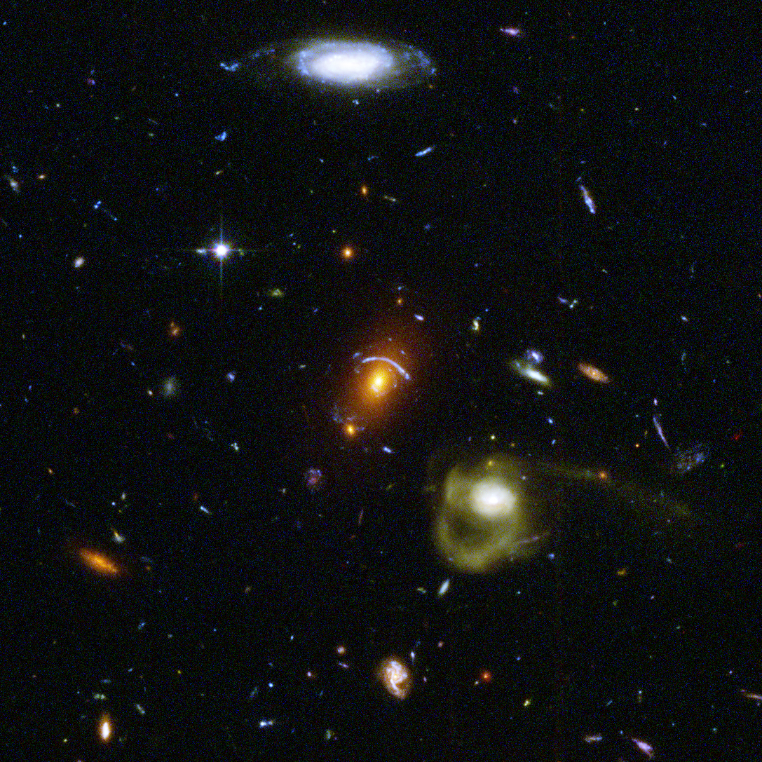 A visual image of numerous galaxies on a black background