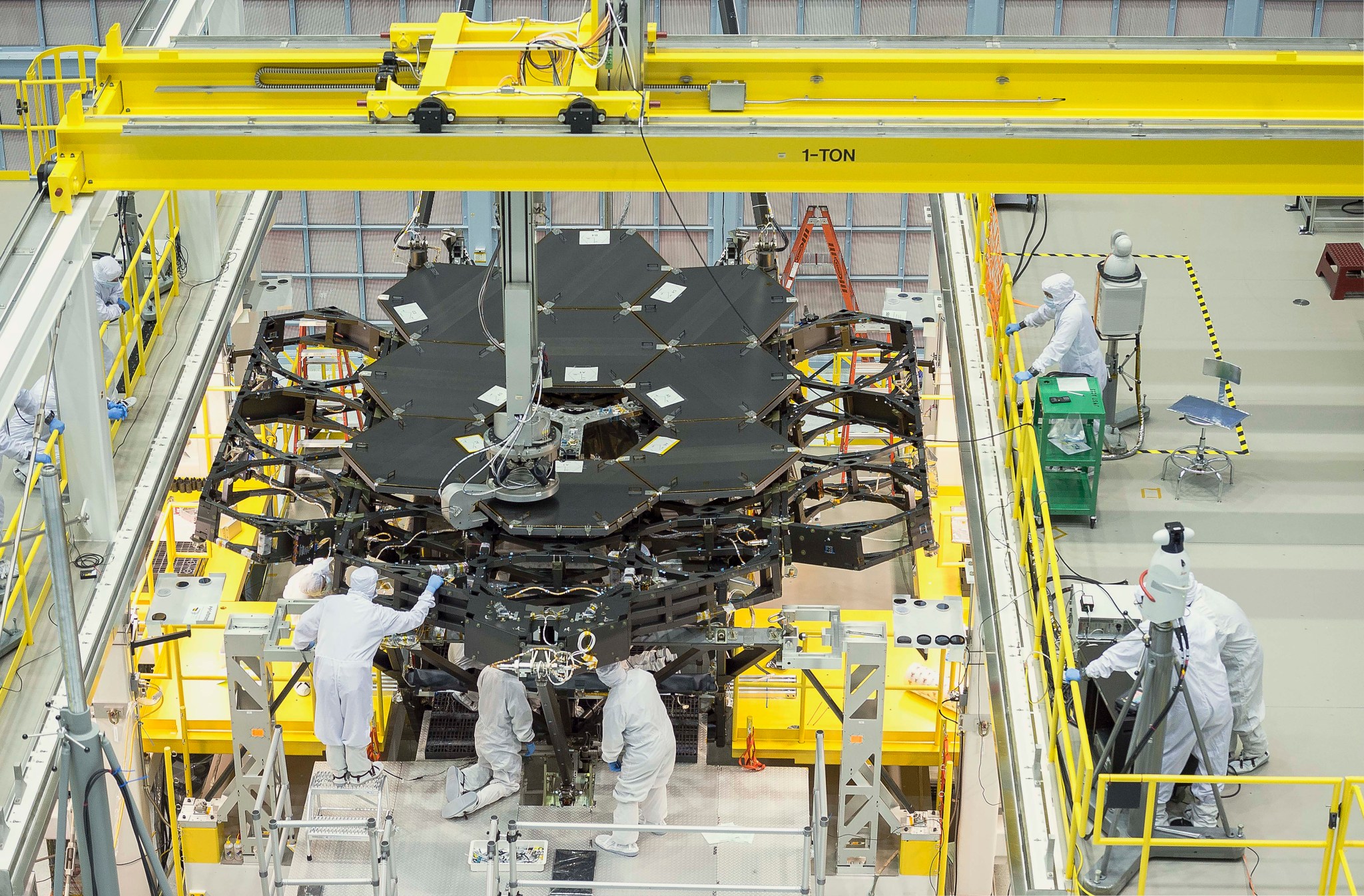 nine primary JWST flight mirrors installed on telescope structure