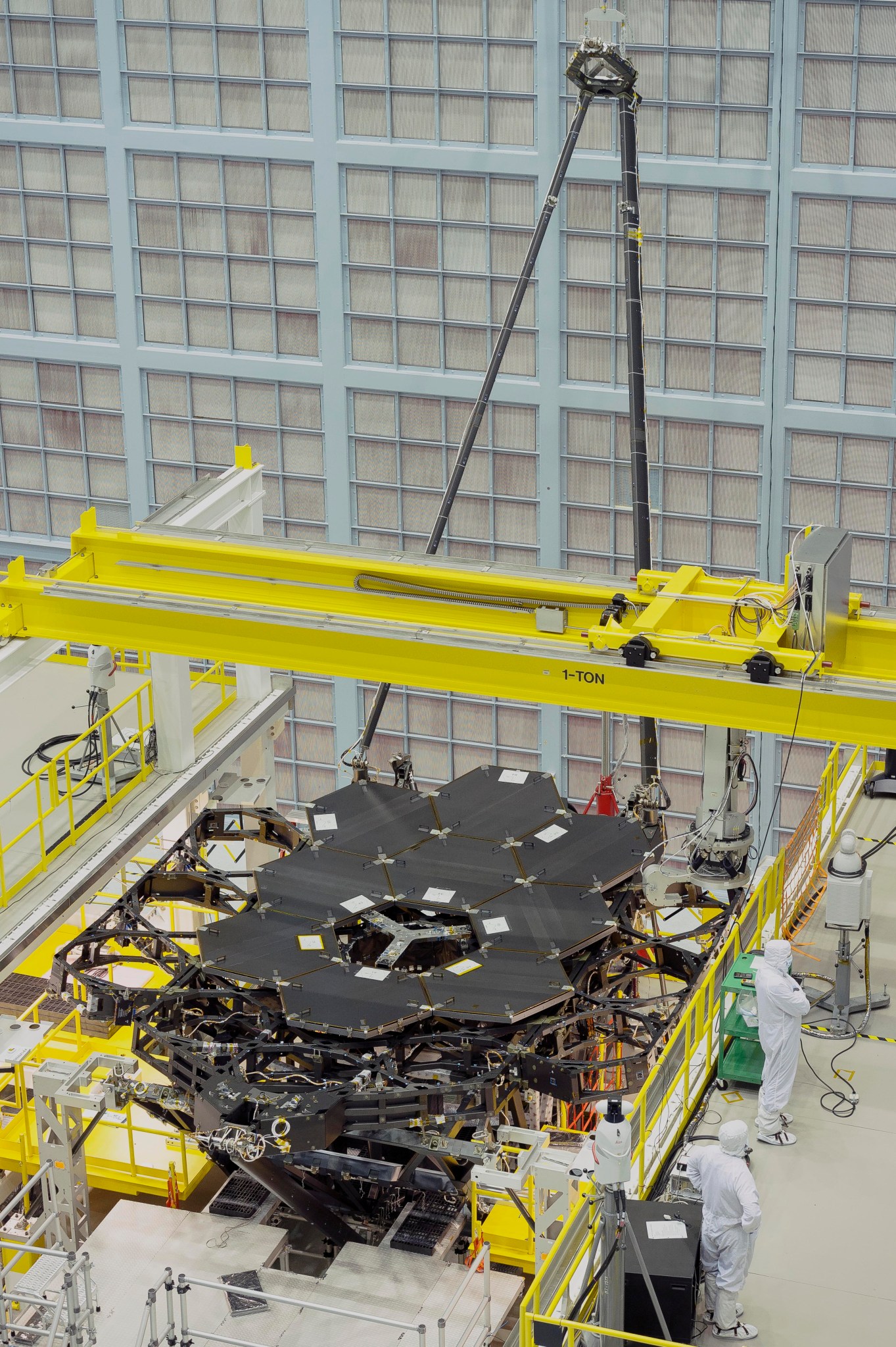 nine primary JWST flight mirrors installed on telescope structure