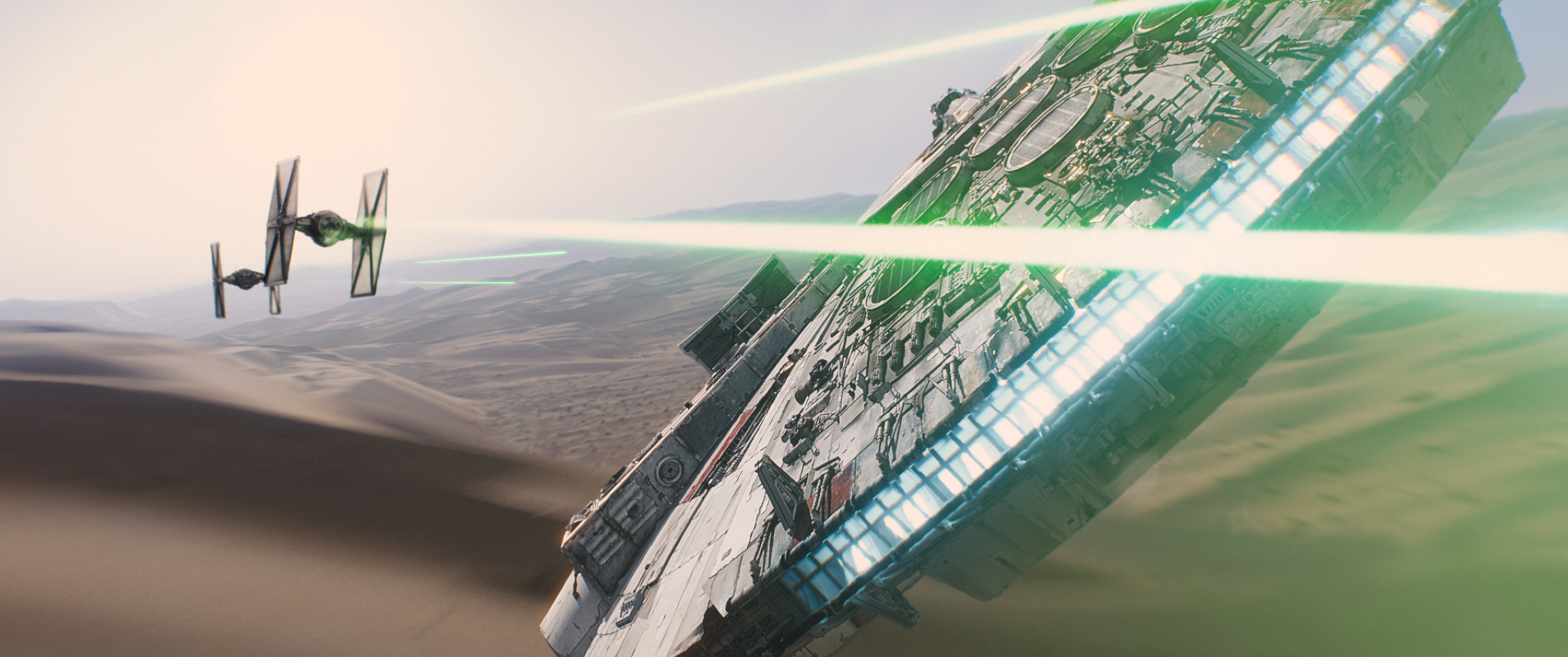 The Millennium Falcon takes on tie fighters in a scene from 'Star Wars: The Force Awakens.' Credit: Disney