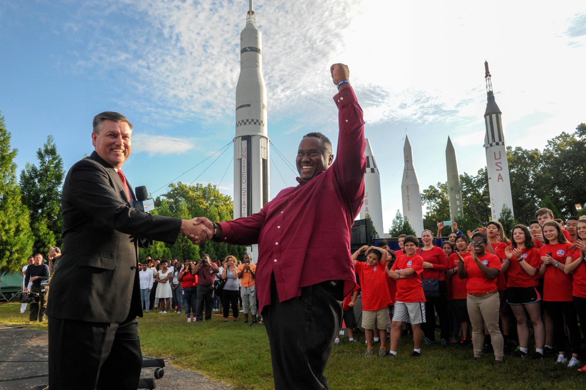 Trent Griffin, right, is congratulated by Marshall Space Flight Center Director Patrick Scheuermann. 