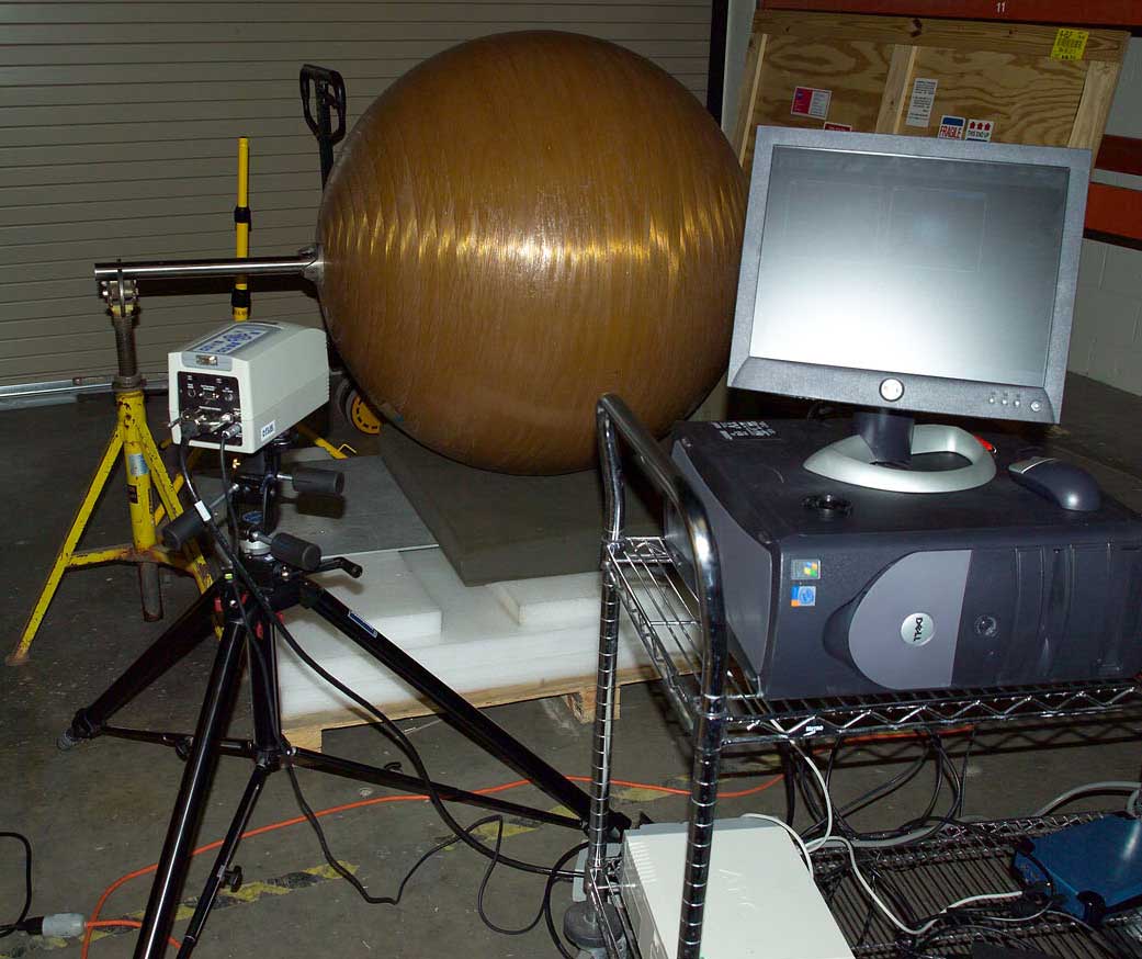 A Kevlar composite overwrapped pressure vessel (COPV) is set up for Infrared (IR) thermography testing.