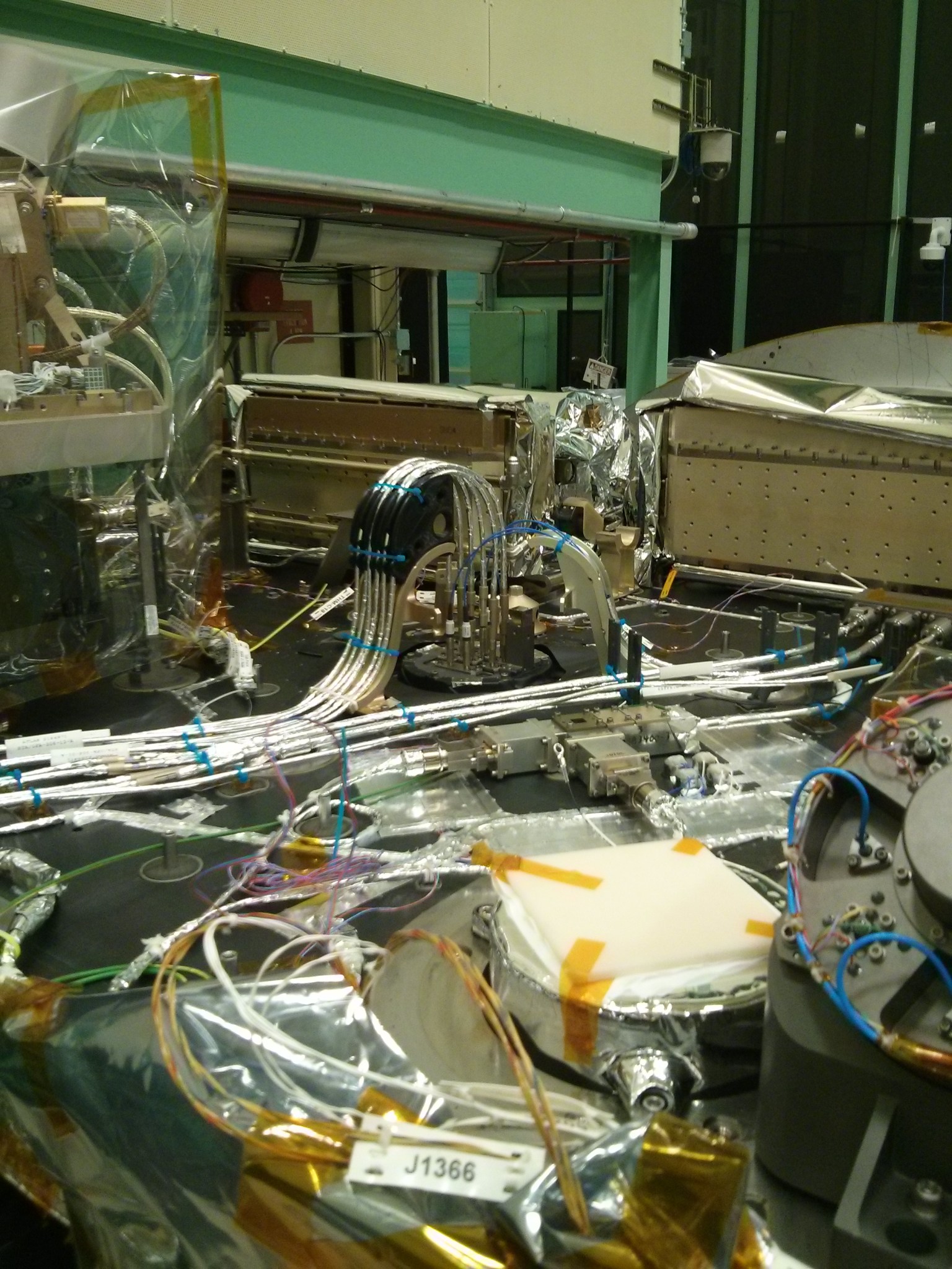 3-D manufactured part is visible in the back of the ATLAS instrument