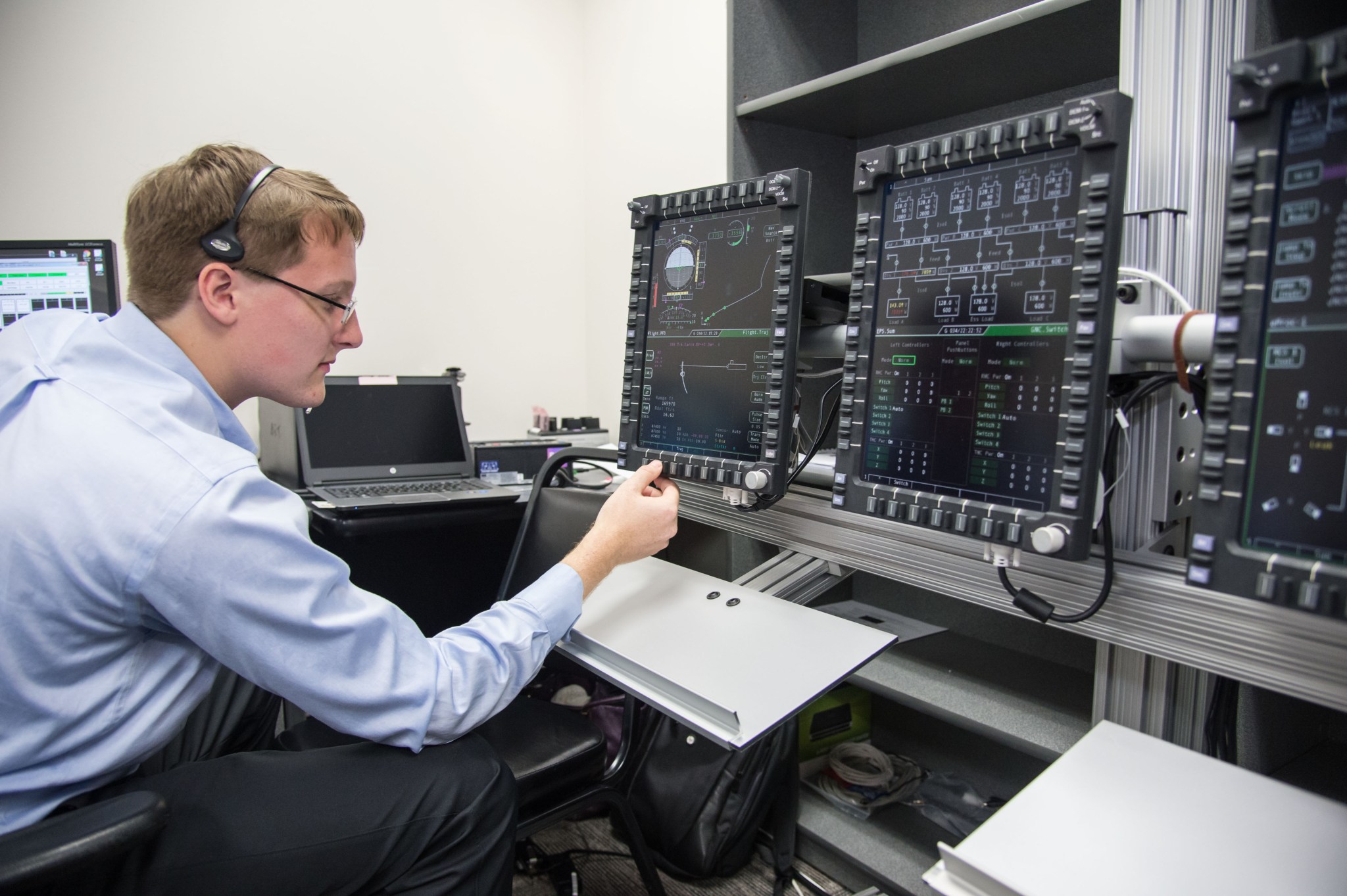 An engineer evaluates Orion’s display and control system. 