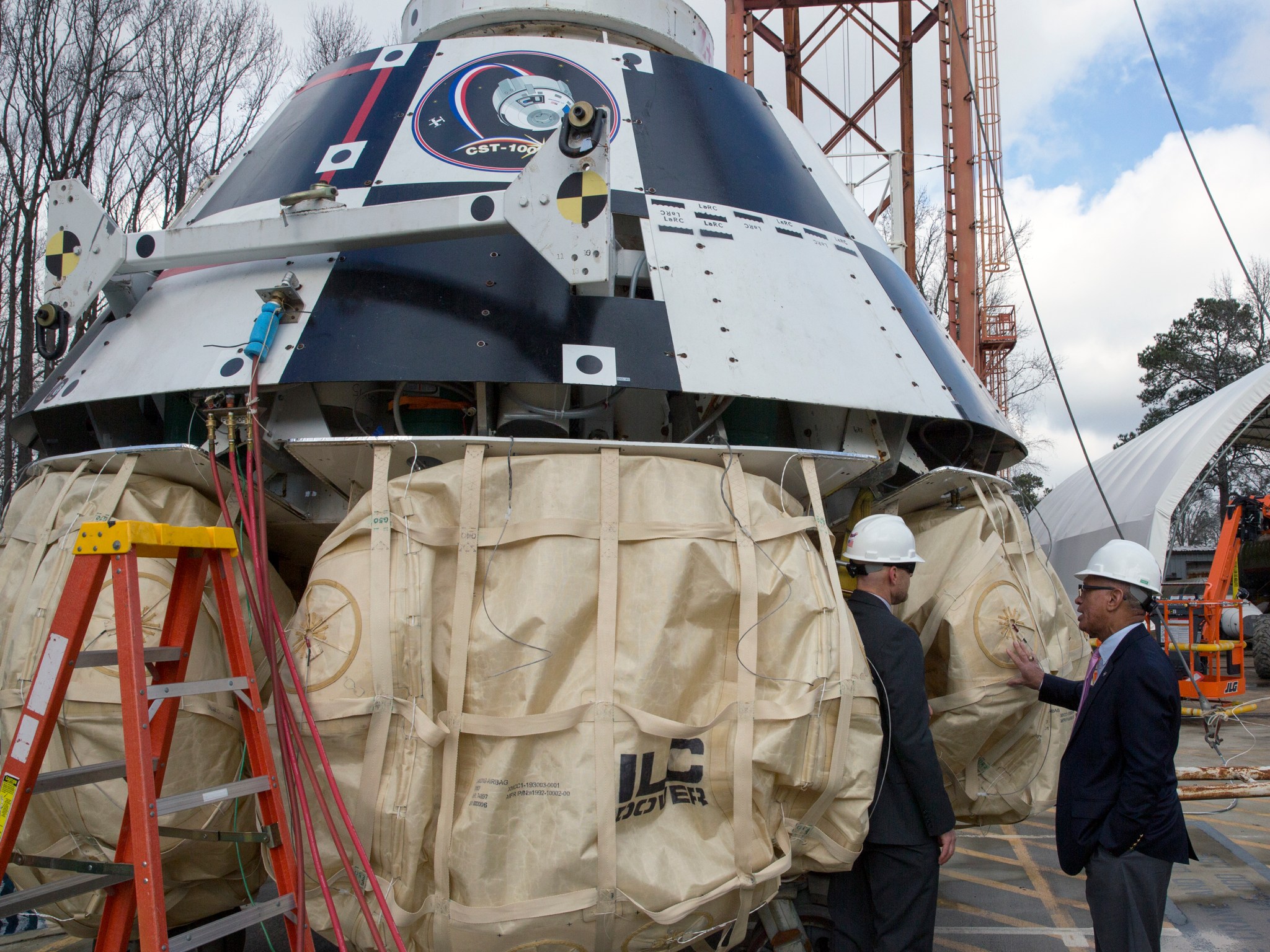 NASA Administrator Charles Bolden takes a look at Boeing's CST-100 Starliner being tested at NASA Langley's Hydro Impact Basin.