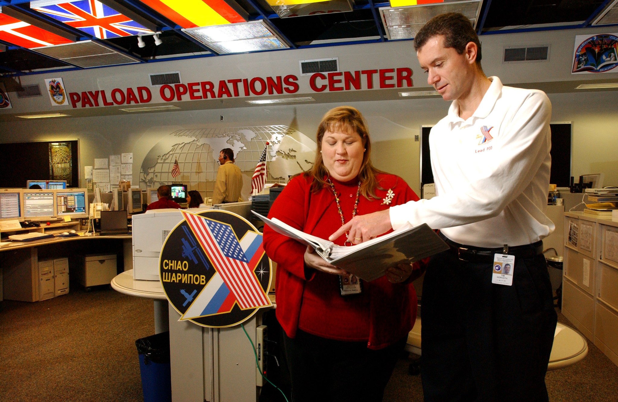 Pat Patterson, left, and fellow payload operations director Tim Horvath go over procedures in 2005 for Expedition 10.