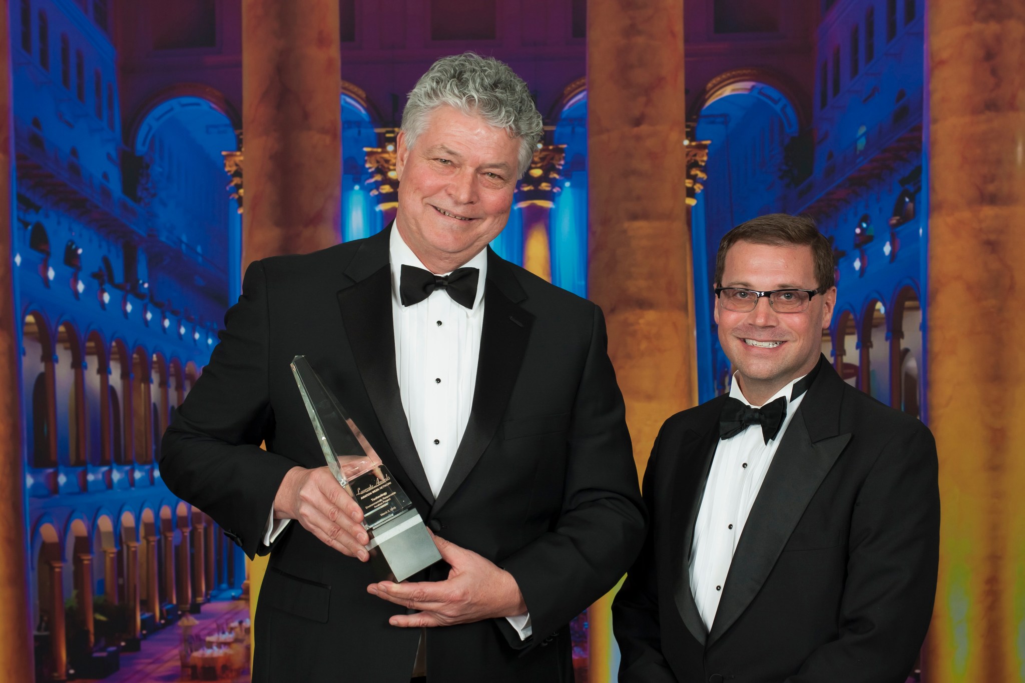 (l) Fay Collier and (r) Michael Bruno with the Laureate award.
