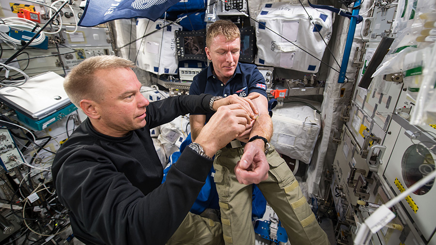 Astronauts Tim Kopra and Tim Peake