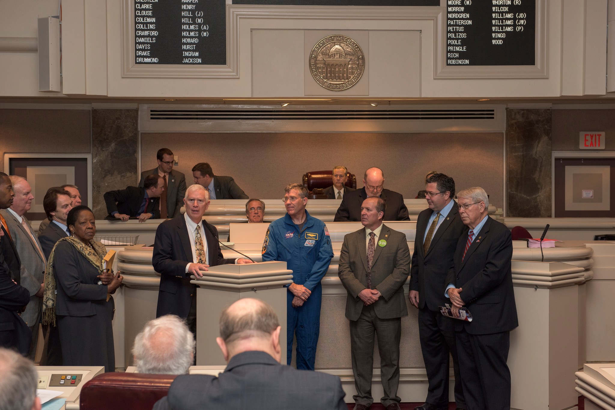 U.S. Rep. Mo Brooks, center, Marshall Center Director Todd May, second from right, and astronaut Steve Bowen, fourth from right.
