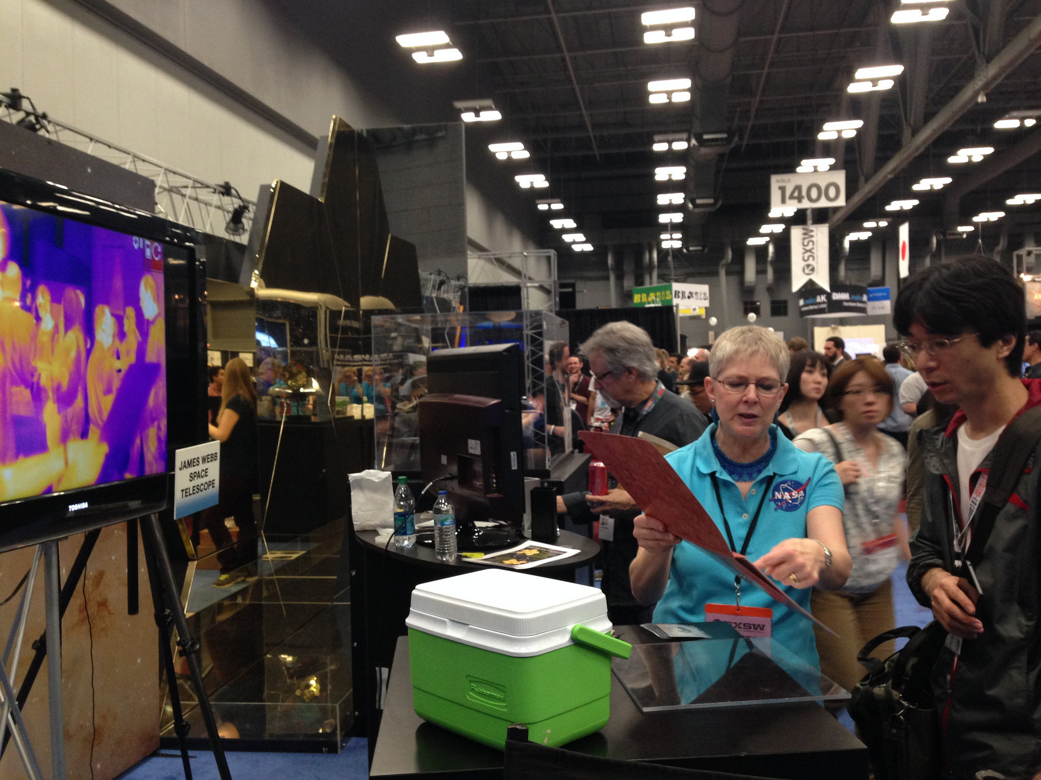 NASA's Colleen Quinn-House explains how the Webb telescope will see in infrared light at the NASA Booth, SXSW 2015.   