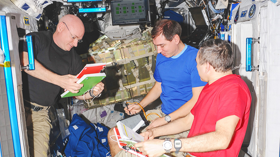 NASA astronaut Scott Kelly and cosmonauts Sergey Volkov and Mikhail Kornienko  of the Russian space agency Roscosmos 