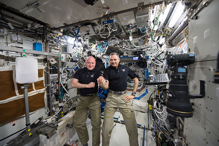 NASA astronaut Scott Kelly and Russian cosmonaut Mikhail Kornienko celebrate their 300th day in space together. 