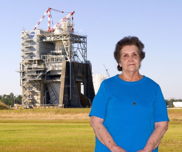 Jeanne Kellar stands in front of the A-2 Test Stand