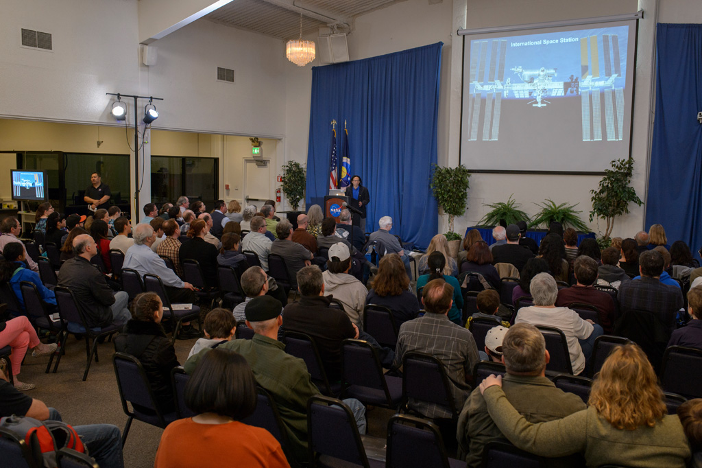 Visitors speak with Ames scientists about the science payloads that were launched on SpaceX, April 8, 2016 and eagerly watched t