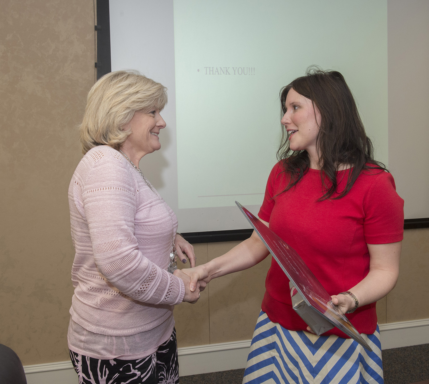 Dr. Jennifer Kiessling, right, is welcomed to NASA's Marshall Space Flight Center March 30 by Deputy Director Jody Singer.
