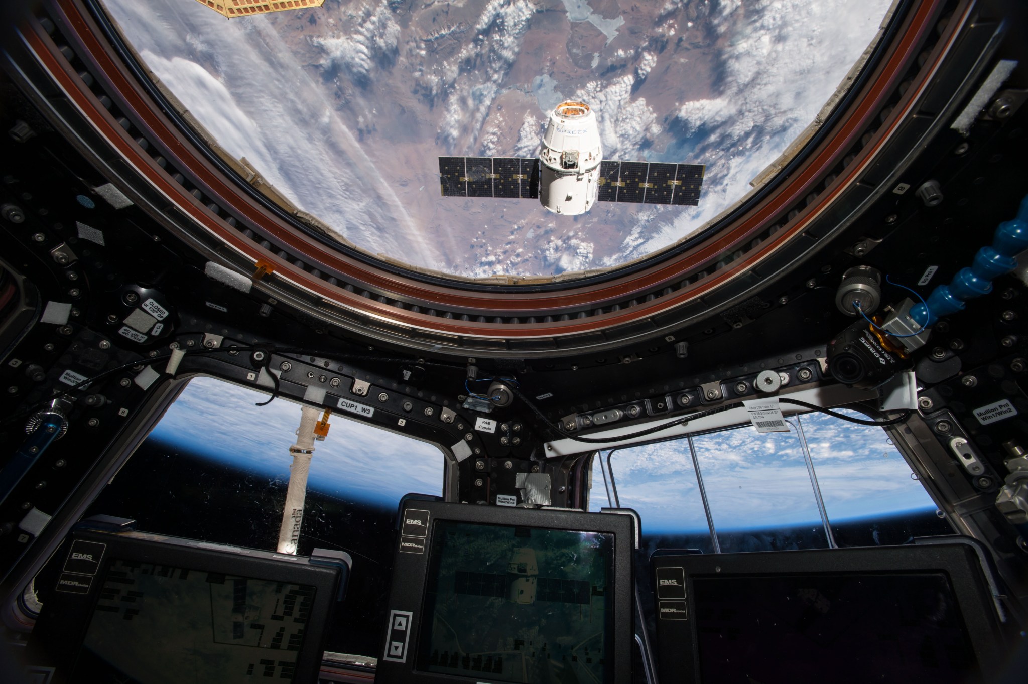 The Dragon spacecraft as seen from the cupola window on the International Space Station on April 10, 2016