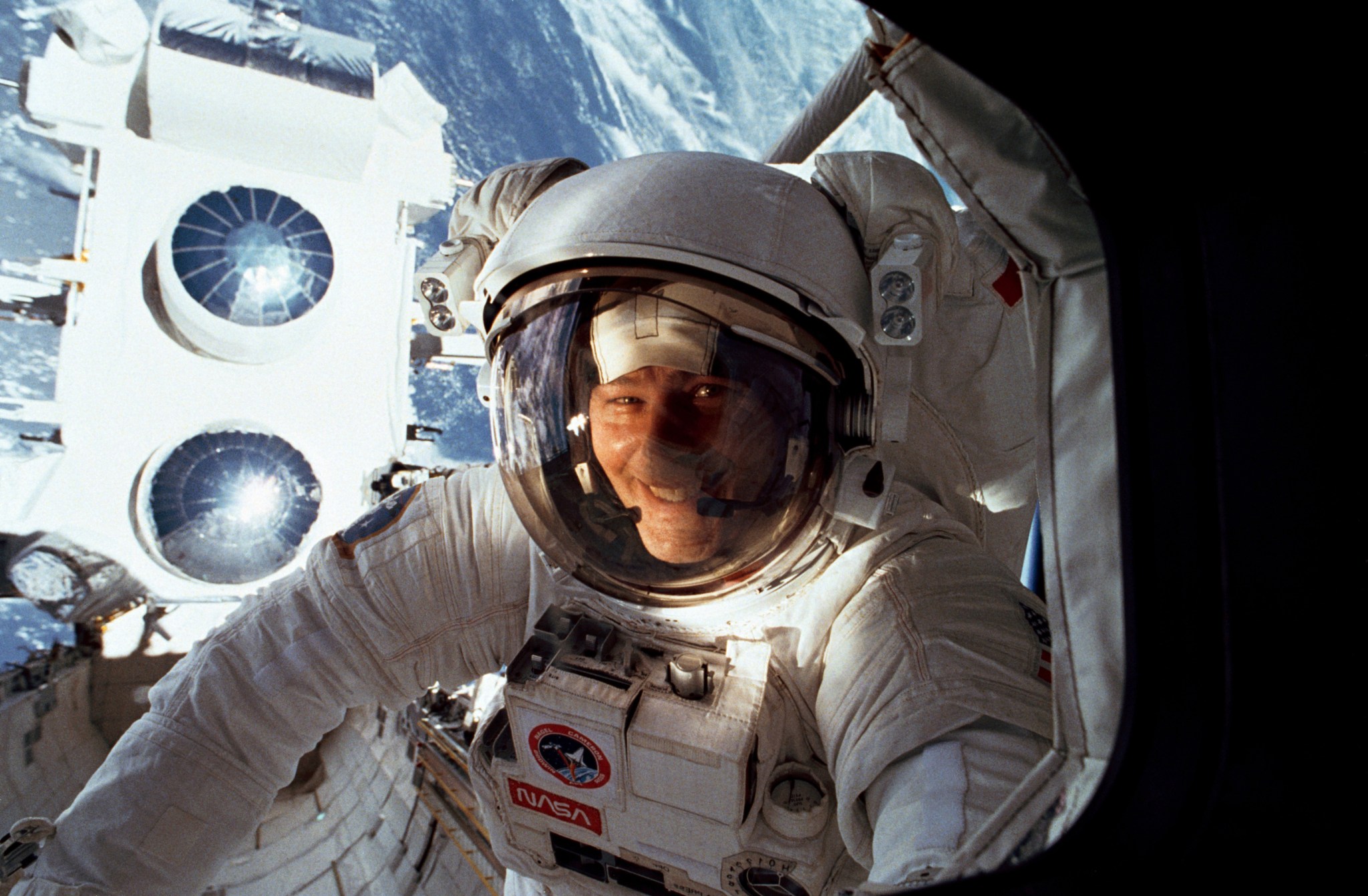 Astronaut Jerry Ross after freeing Compton's antenna