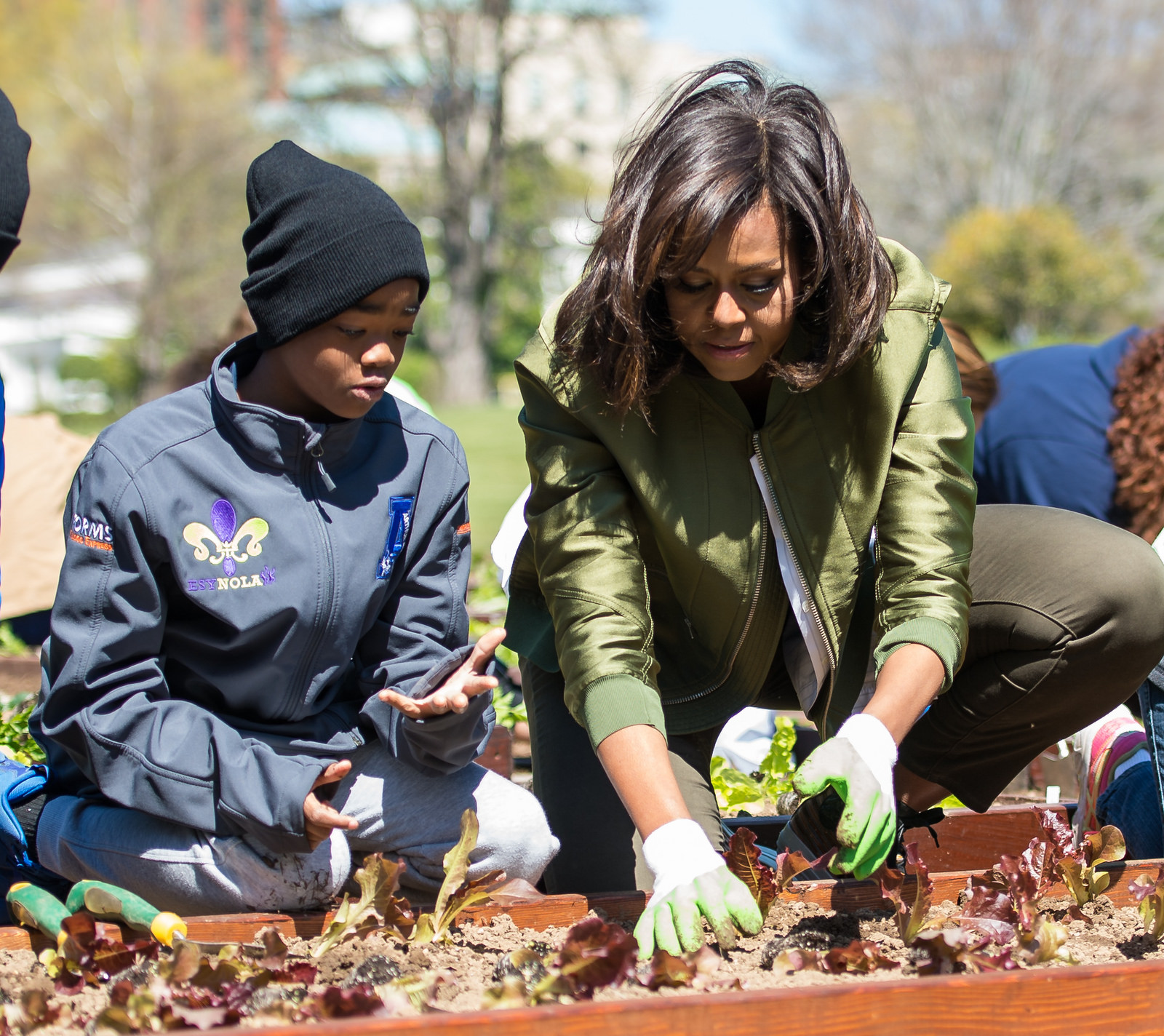 First Lady Michelle Obama plants Veg-03 seeds in White House Kitchen Garden.