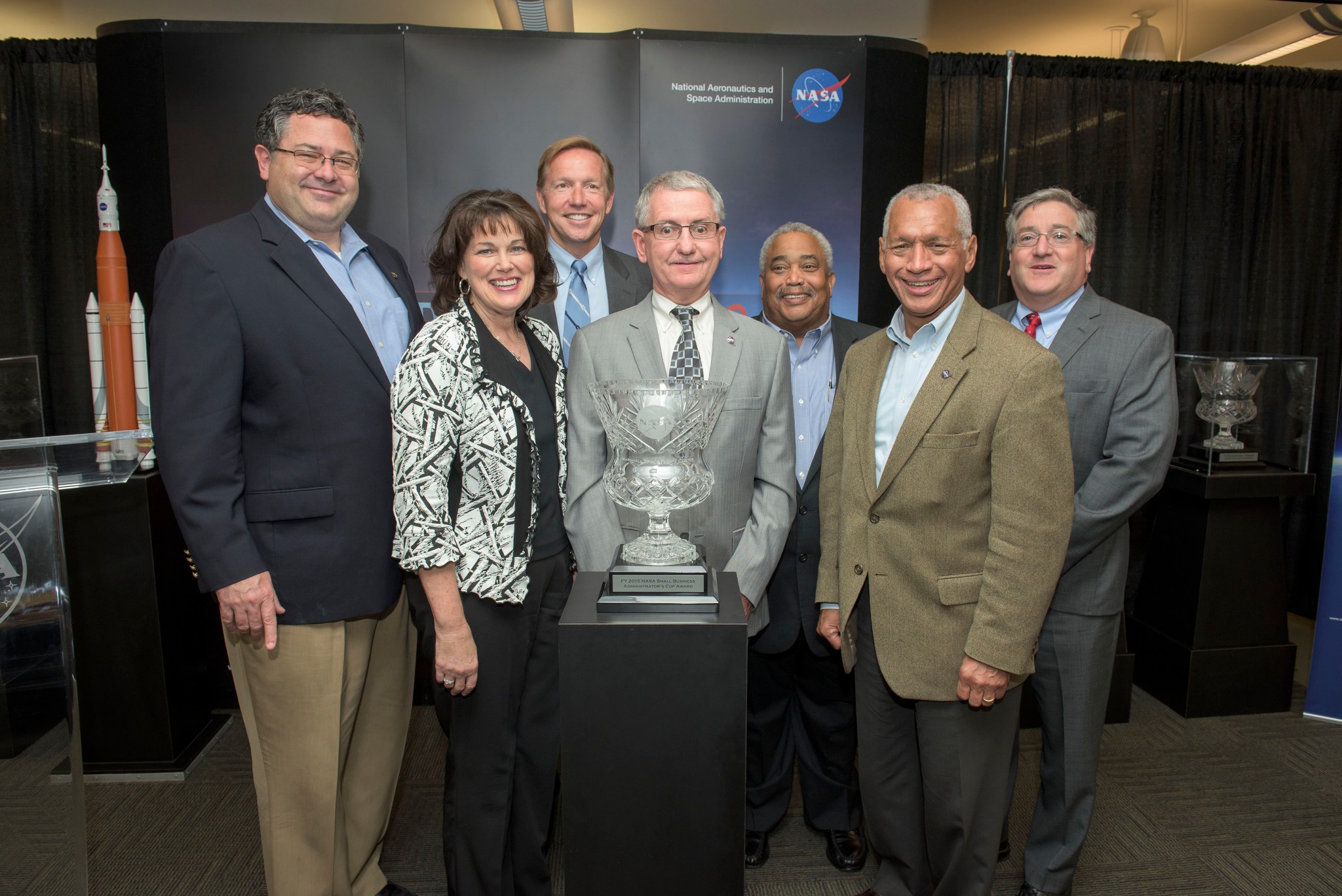 From left, Todd May, Robin Henderson, Steve Miley, David Brock, Glenn Delgado, Charles Bolden, and David Iosco