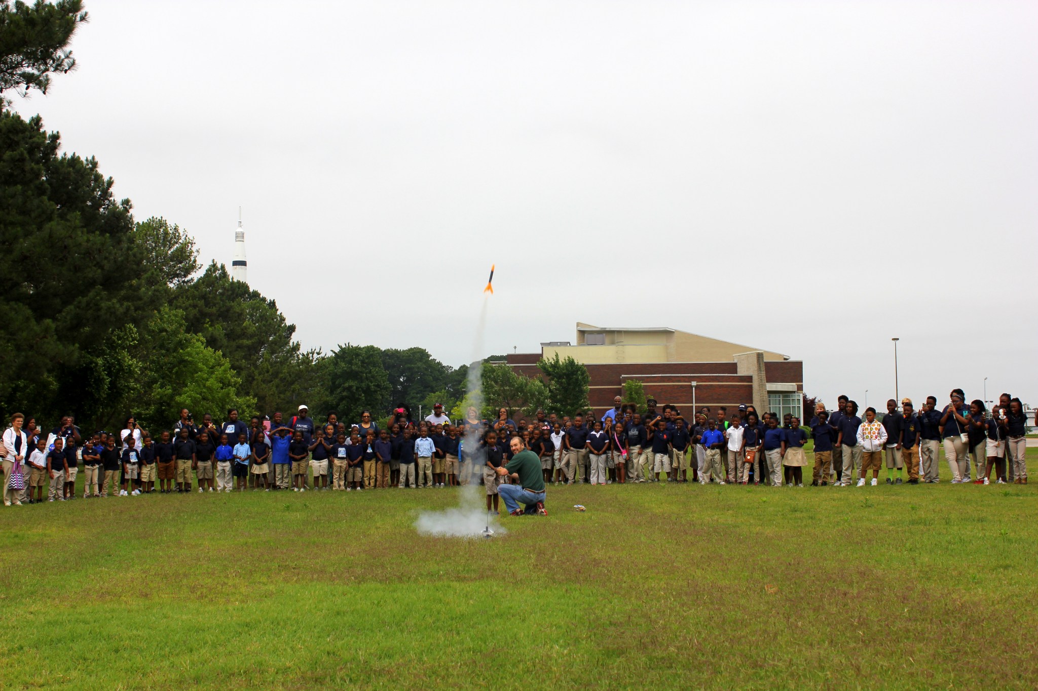 Hard work pays off as students from Payne Elementary School in Selma, Alabama, watch an amateur rocket liftoff May 18.