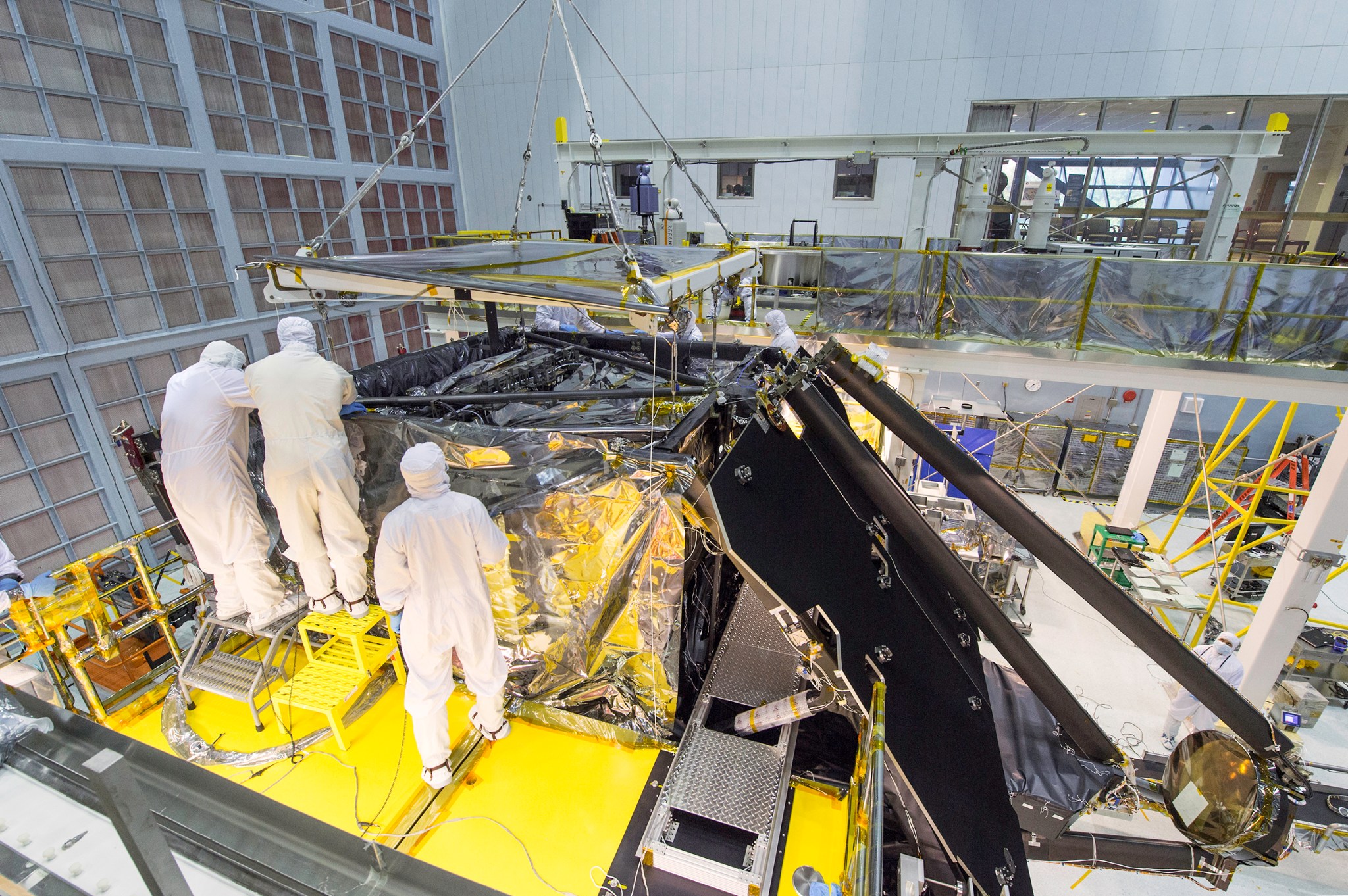 Goddard clean room with the JWST telescope in it.