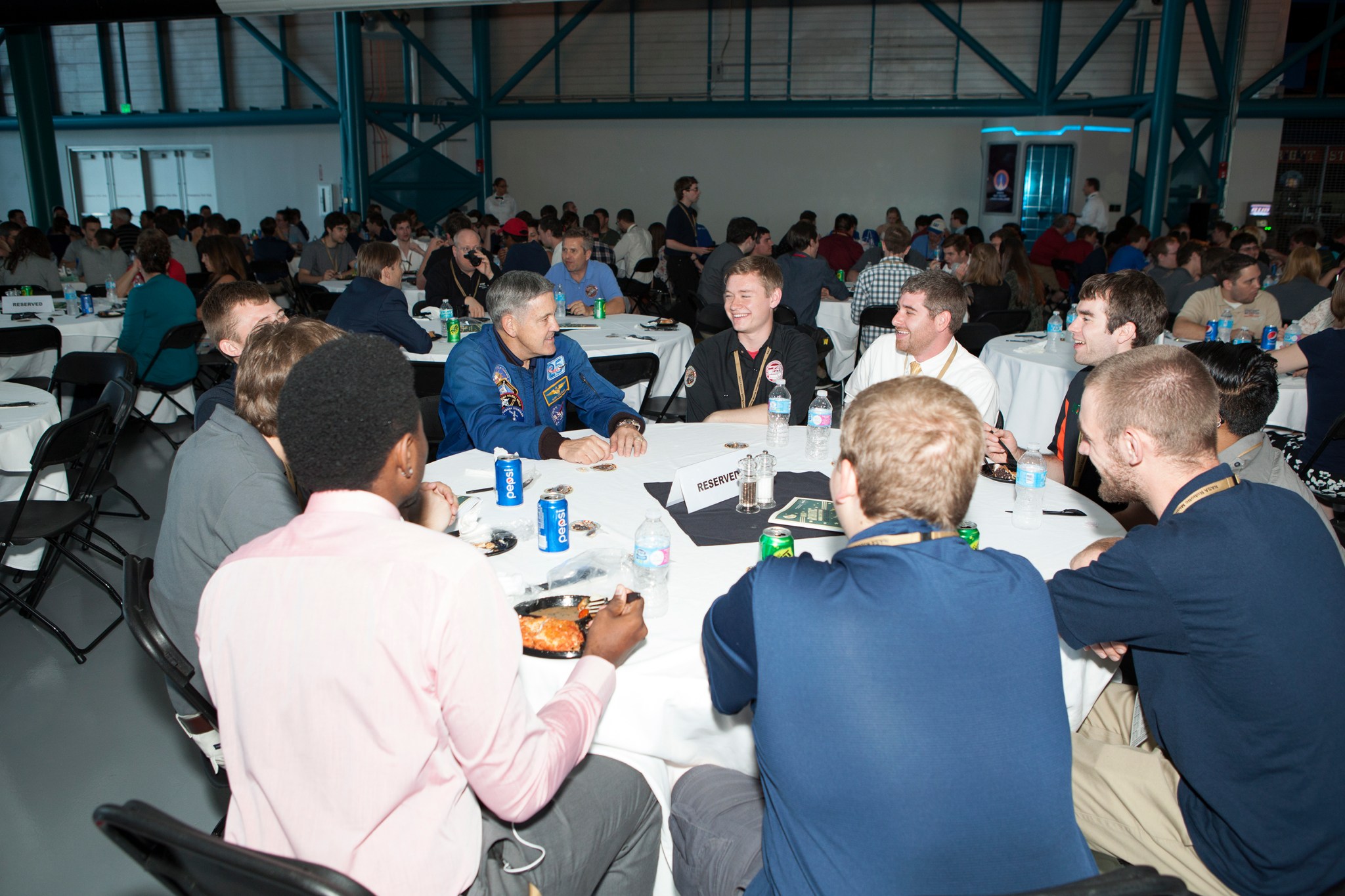 Bob Cabana, director of Kennedy, talks with Robotic Mining Competition participants.