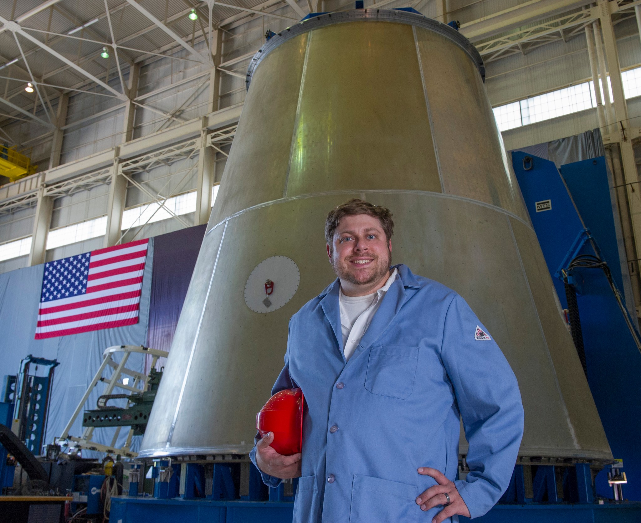Justin Littell, a mechanical engineer at Marshall, is helping build NASA's new rocket, the Space Launch System. 