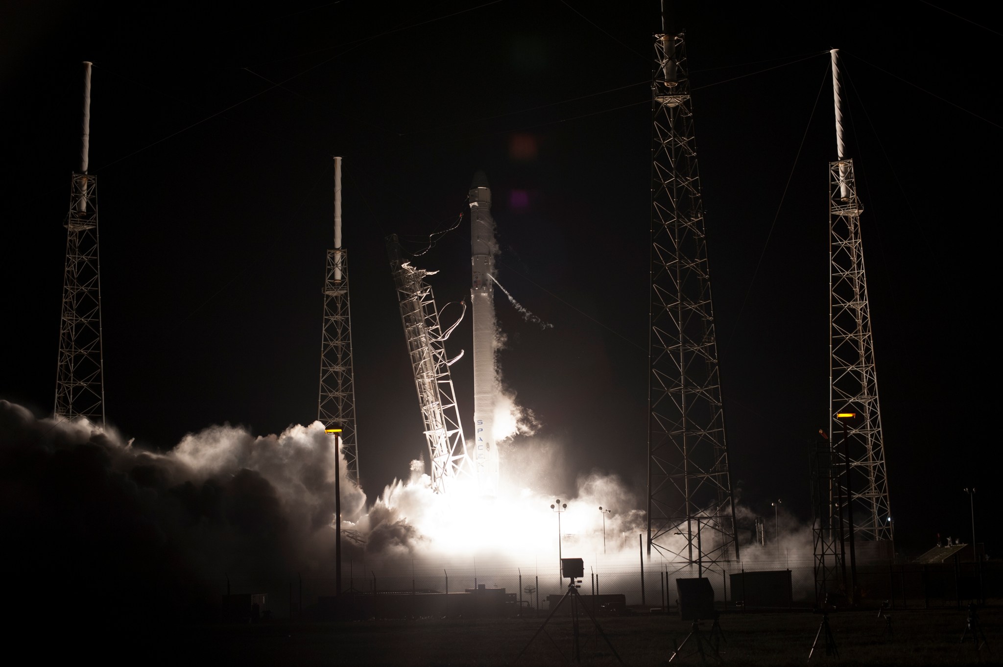 Nighttime launch of Falcon 9 rocket with Dragon capsule aboard