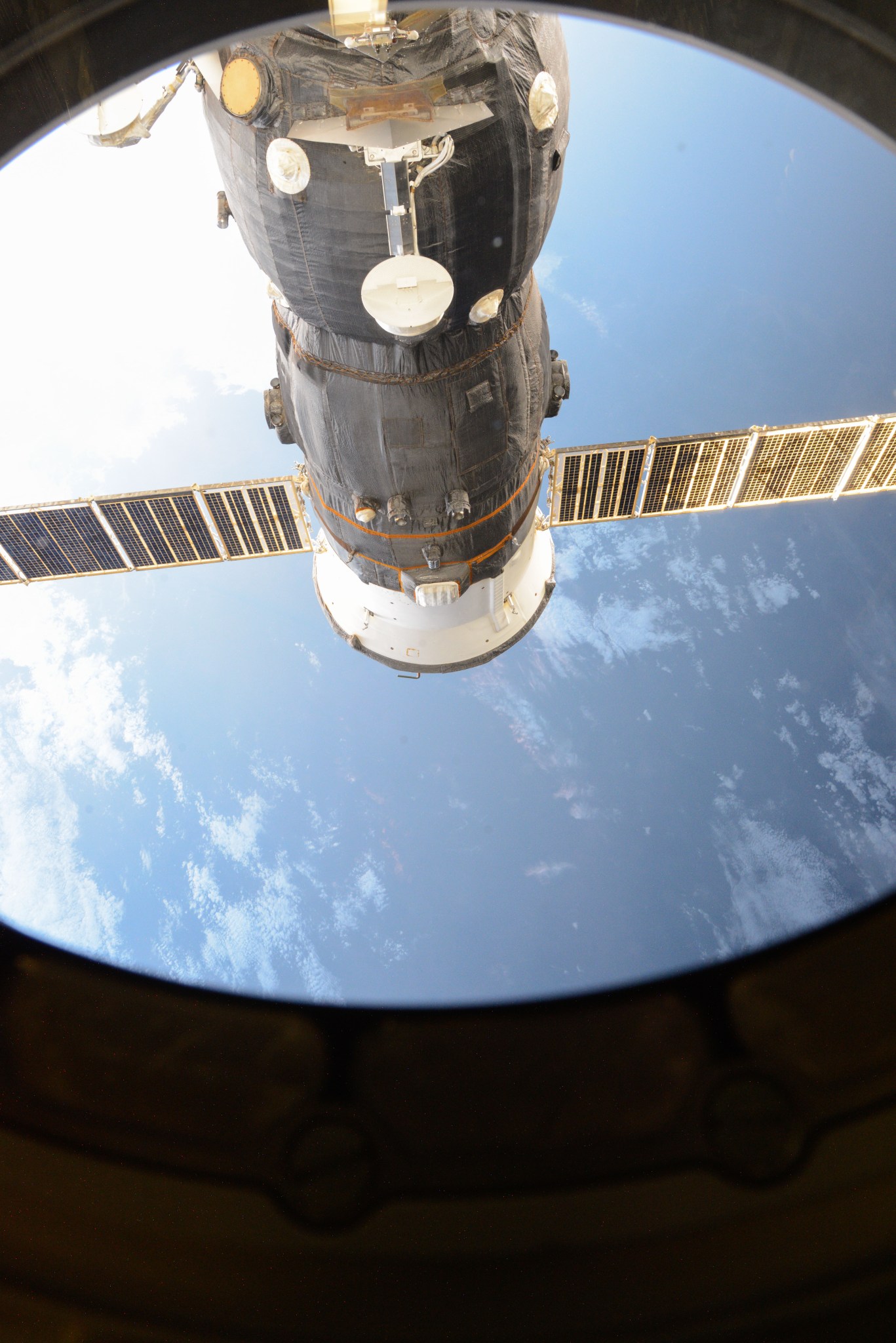 The unpiloted ISS Progress 62 Russian cargo ship is seen docked to the Pirs docking compartment of the International Space Stati