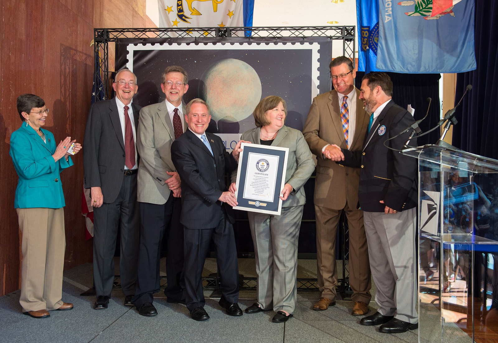 Guinness World Records official congratulates the New Horizons team