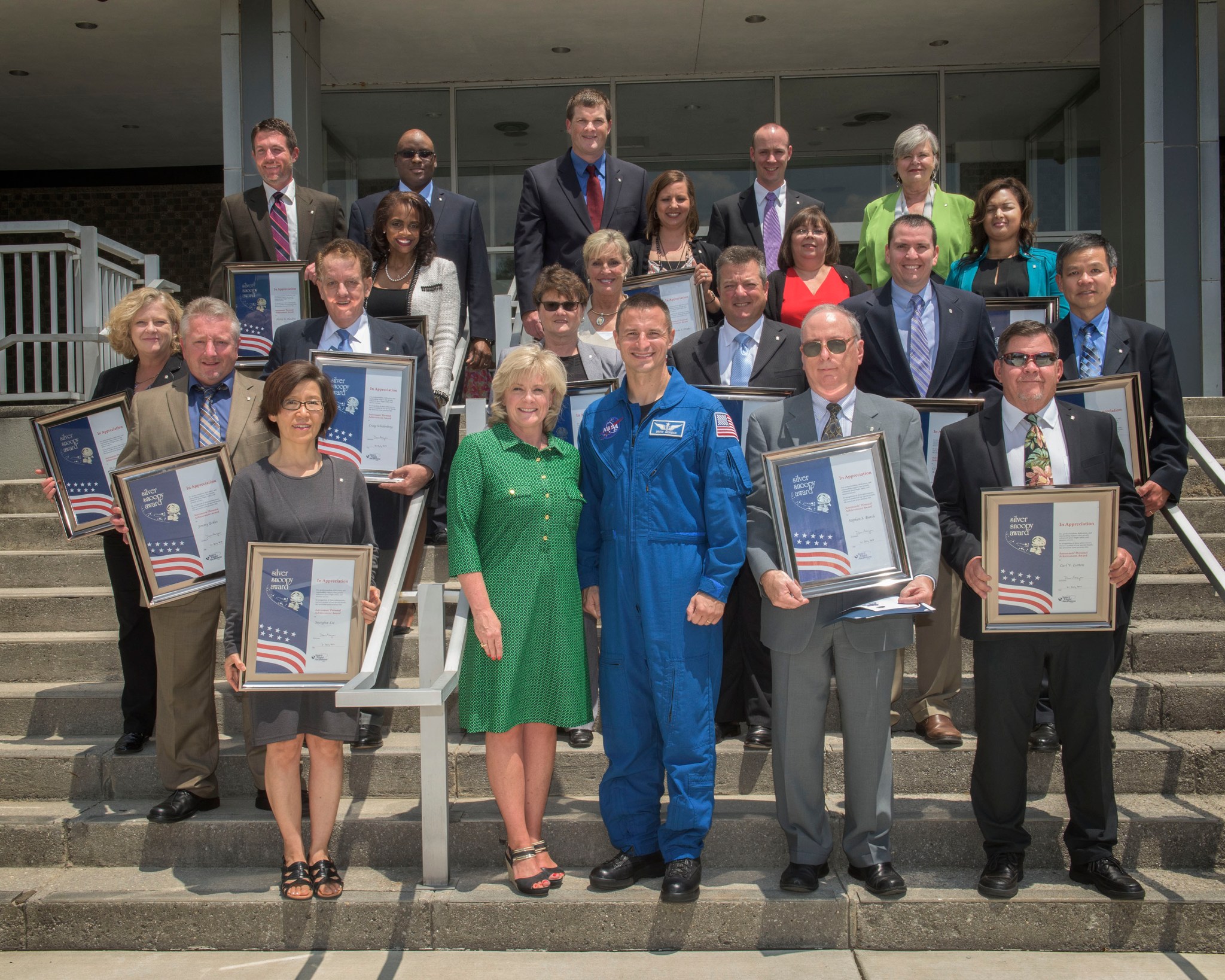 Silver Snoopy honorees gather July 21 with astronaut Andrew Morgan, center foreground; and Marshall Deputy Director Jody Singer.