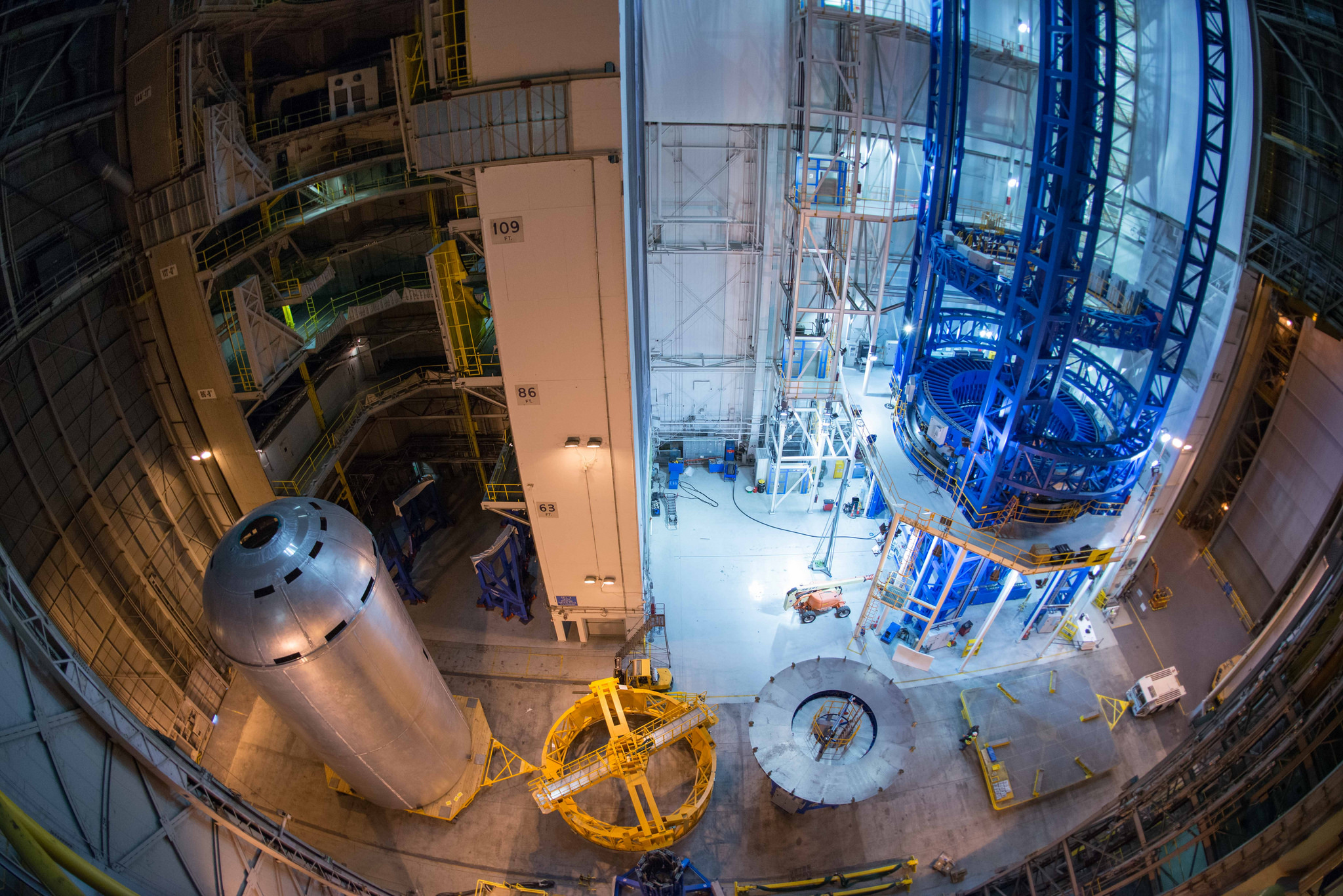 A liquid hydrogen tank weld confidence article (left) for the core stage of NASA’s new rocket, the Space Launch System