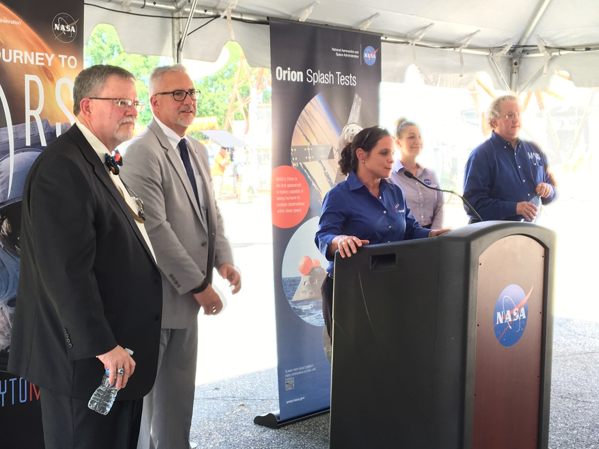 Lara Kearney, manager of the Orion Crew and Service Module Office, speaks to visitors just before the Aug. 25, 2016 drop test.
