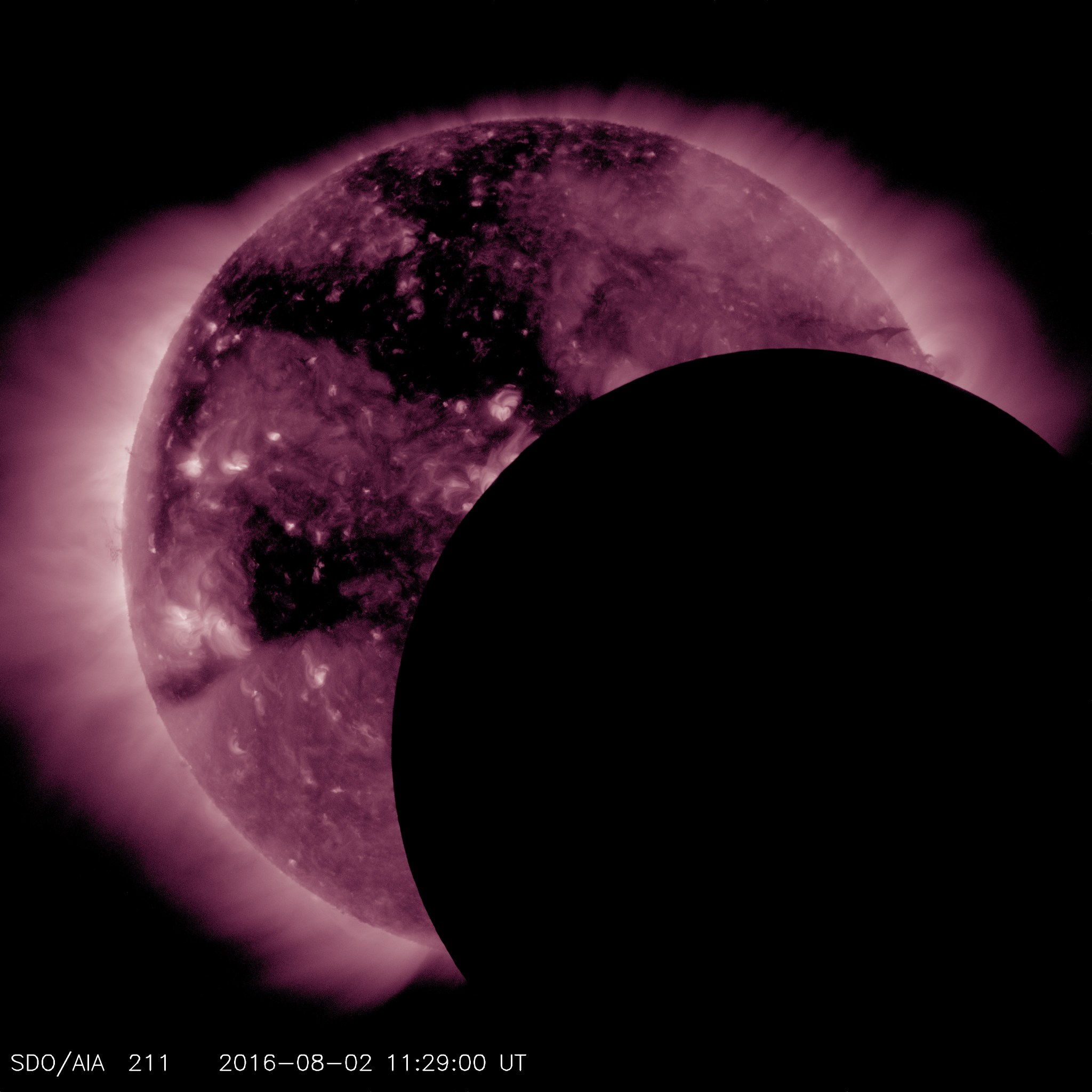 SDO view of moon passing across the face of the sun