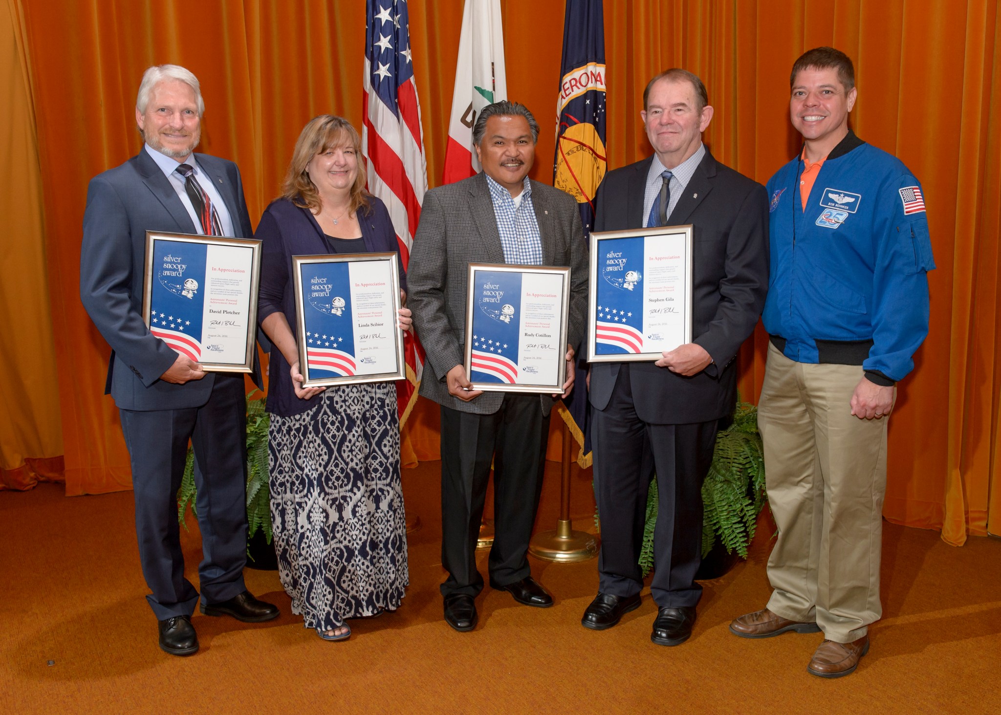 Silver Snoopy Award honorees David Pletcher, Linda Scibior, Rudy Cotillion and Steve Gila with NASA Astronaut Robert L. Behnken.
