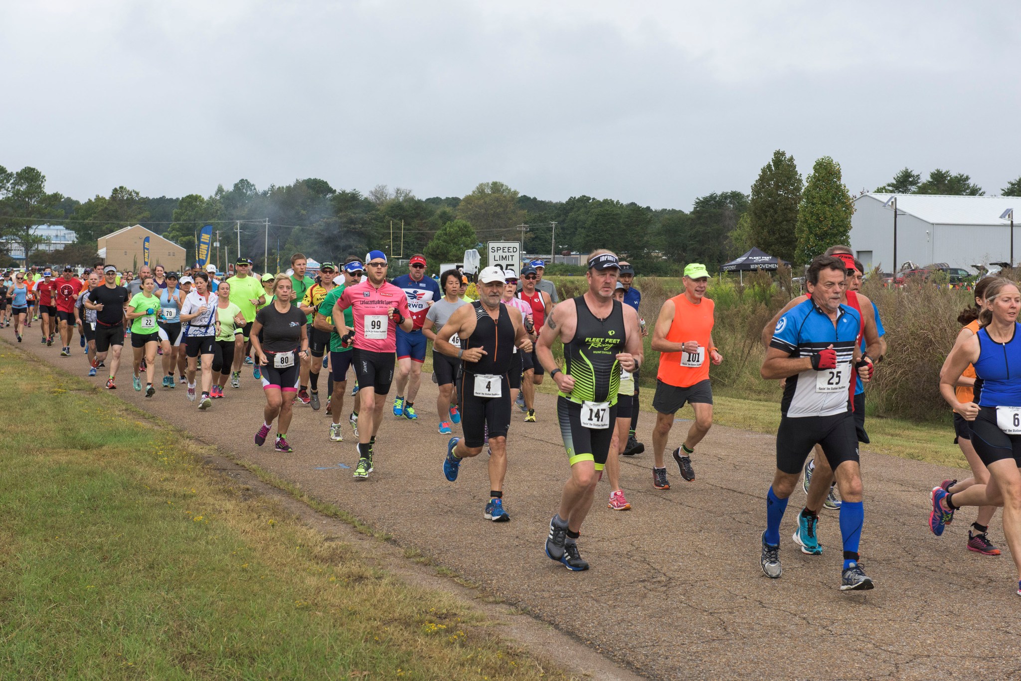 Athletes begin the running section of the 2015 Racin' the Station duathlon outside the Marshall Wellness Center. 