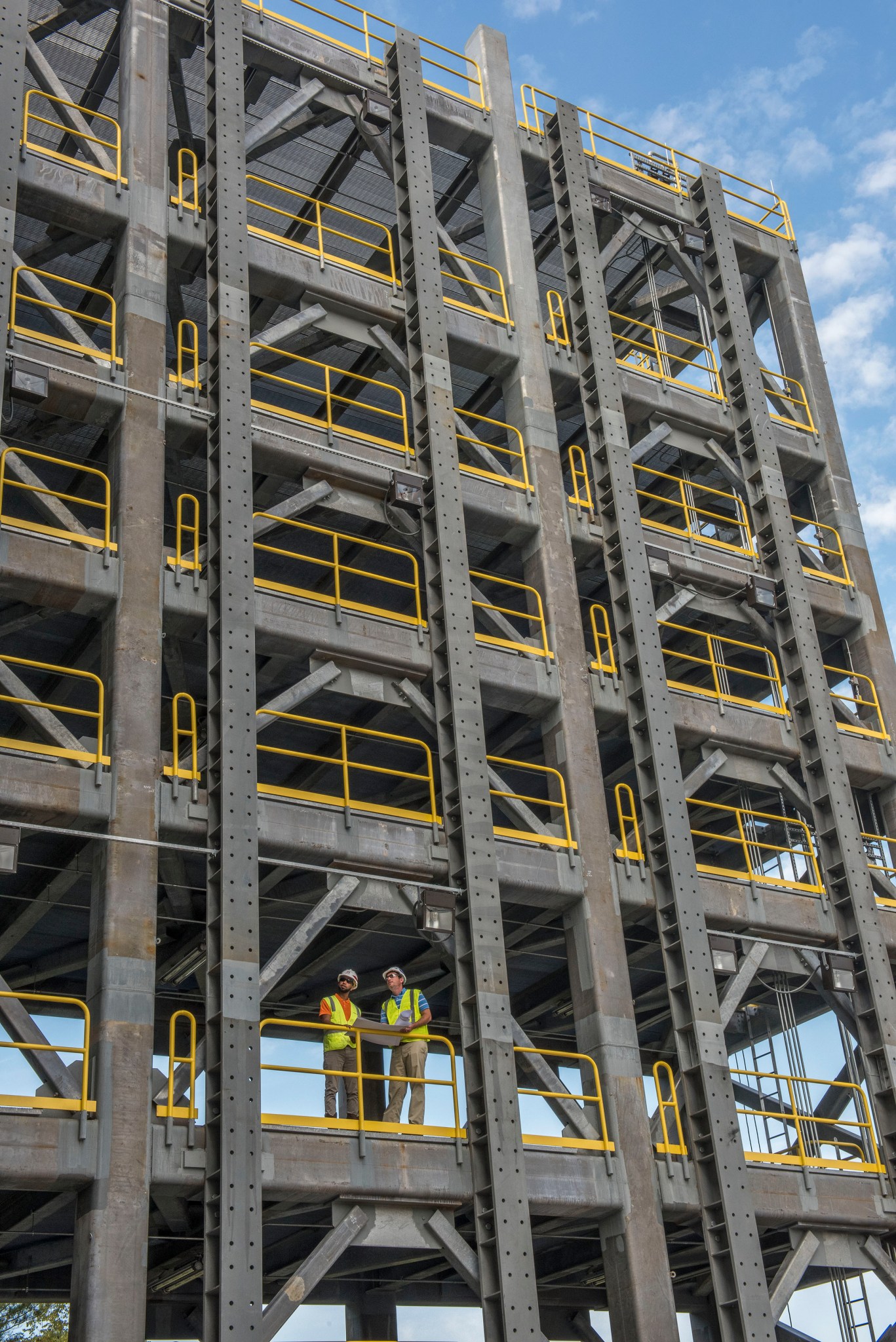 Phil Hendrix, right, and Curtney Walters compare blueprint plans of Structural Test Stand 4697