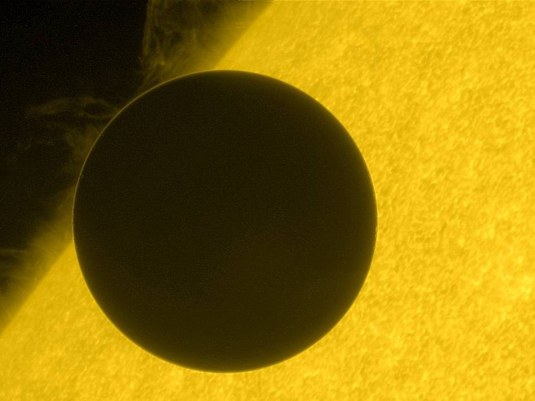 Image of Venus taken by Hinode. Venus is just beginning its journey across the face of the sun. 
