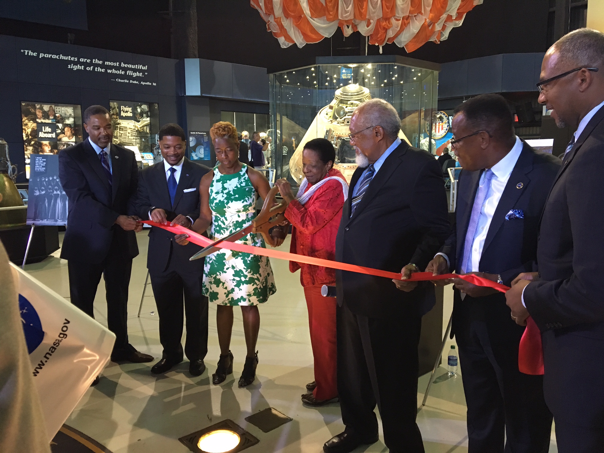 Alabama State Rep. Laura Hall, center, cuts a ceremonial ribbon at the U.S. Space & Rocket Center in Huntsville Sept. 24.
