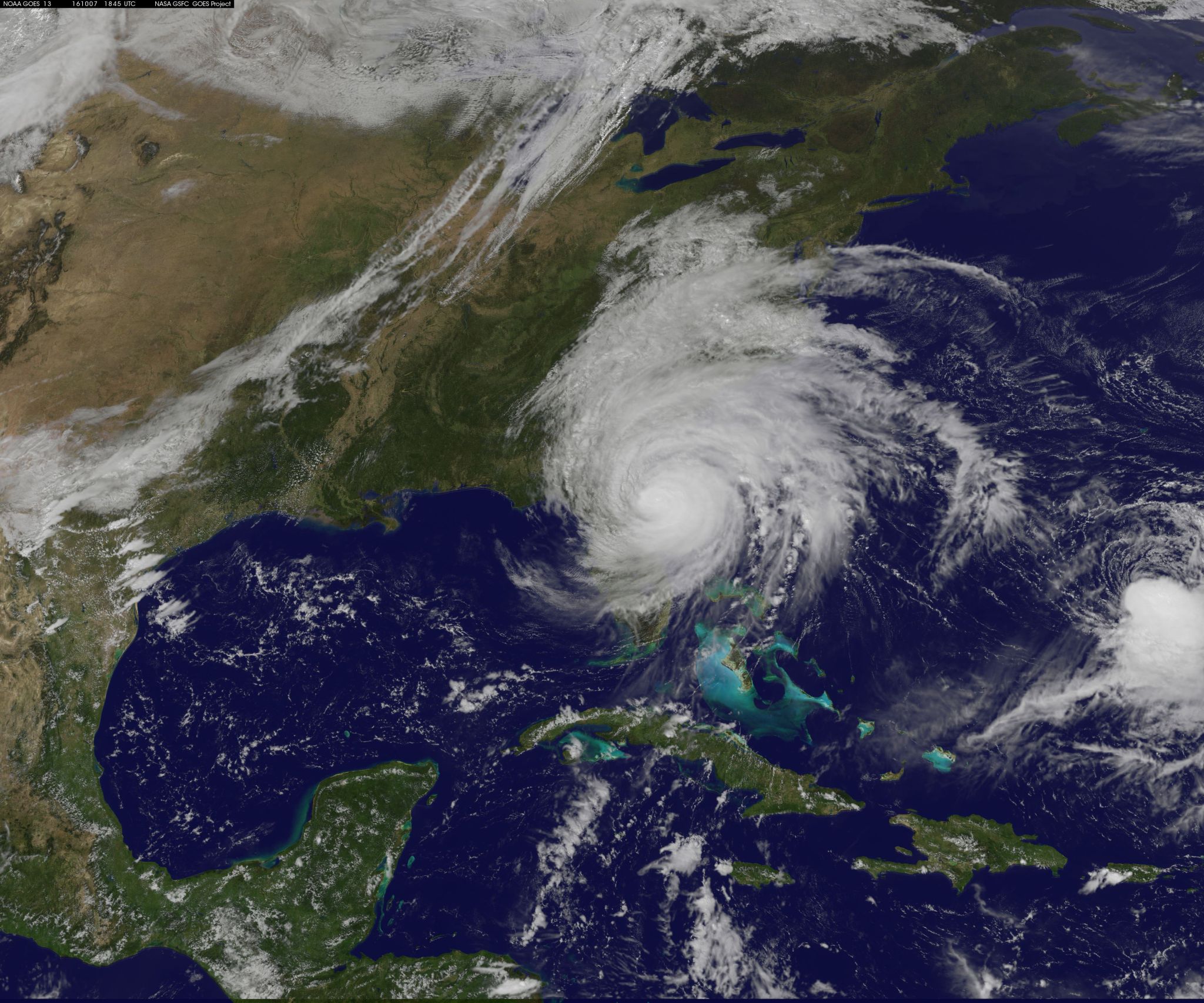 Satellite image of Matthew, a spiral cloud over Florida.