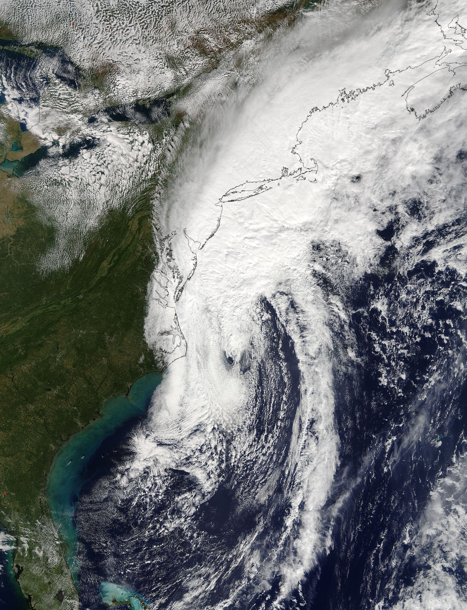 Satellite image of Hurricane Matthew, which has covered the upper Atlantic coast of the US in a big white cloud mass.